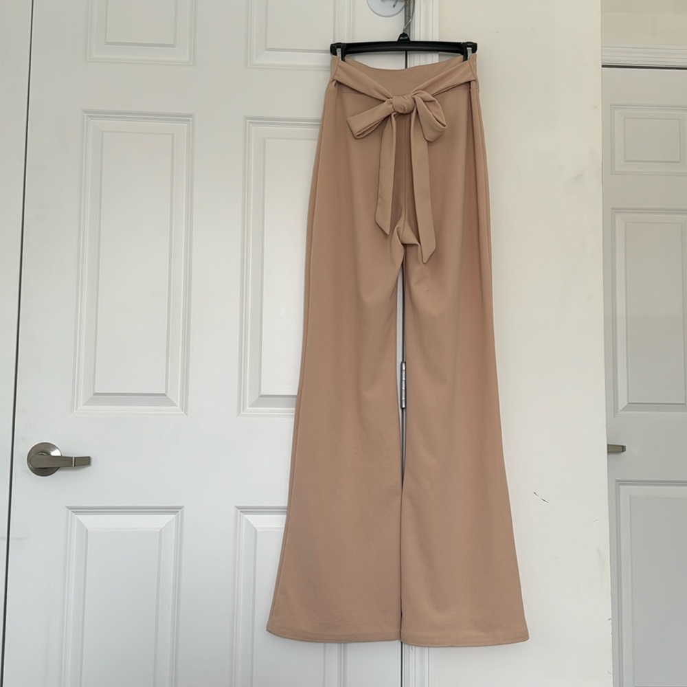 Small blush nude Windsor bell bottoms w/bow waistband. stretchy fabric material.